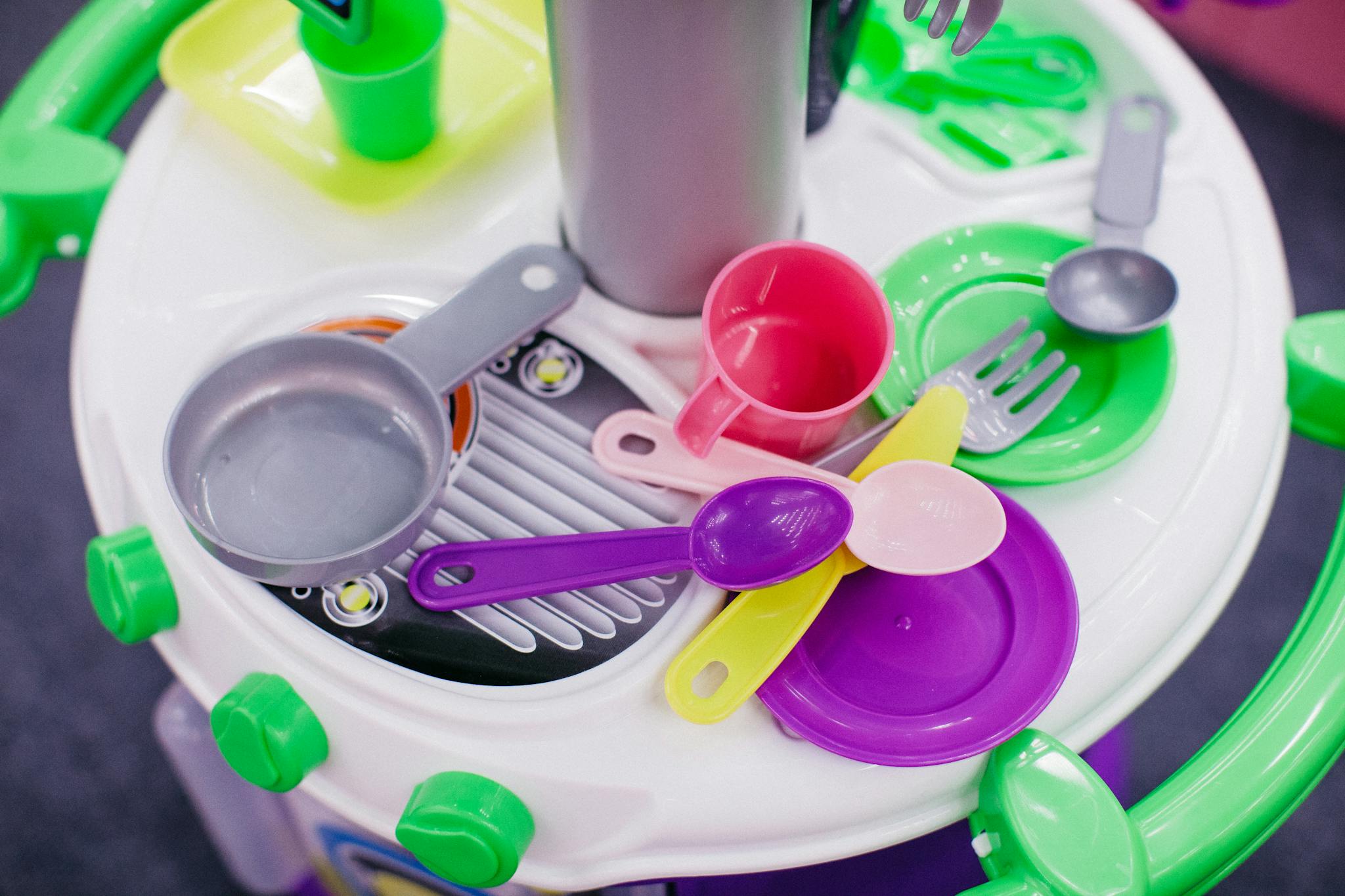 Bright and colorful plastic kitchen toys for children's imaginative play.